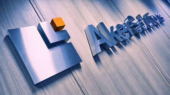 Picture of Aker Solutions' logo on a wall